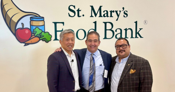 (From left) St. Mary’s Food Bank President & CEO Milt Liu, Phoenix IDA Deputy CEO Mike Santellanes and Marcos Gaucin with St. Mary’s Food Bank